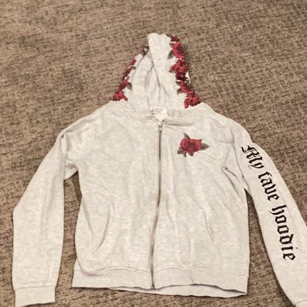 Decorative, feminine zip up hoodie